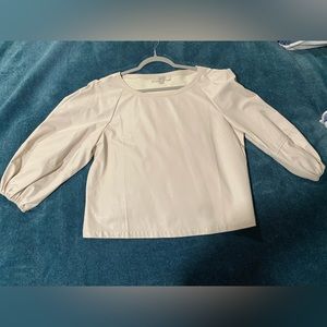 Small cream leather-like blouse